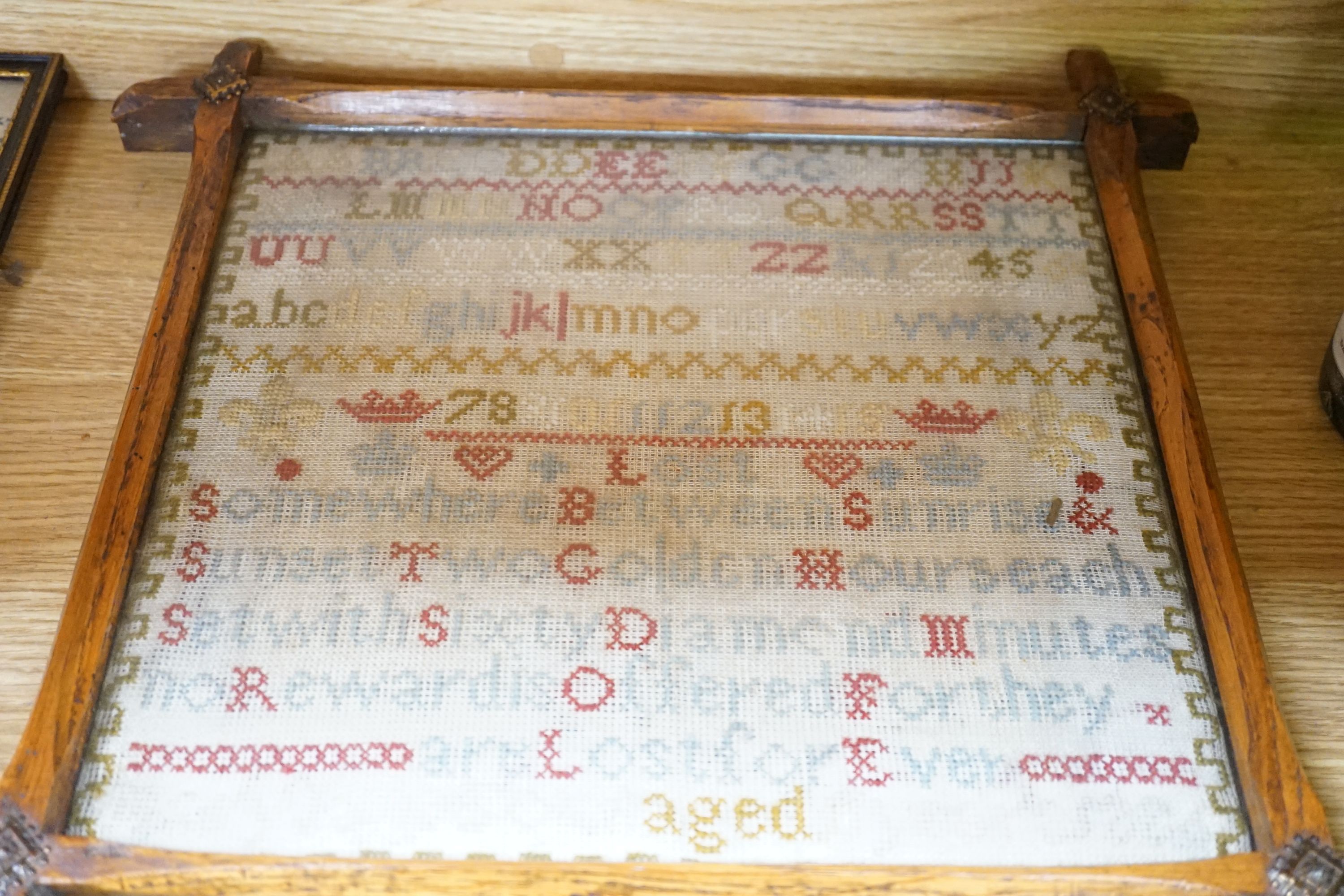 Four 19th century samplers, in glazed wood frames, largest 42cm high